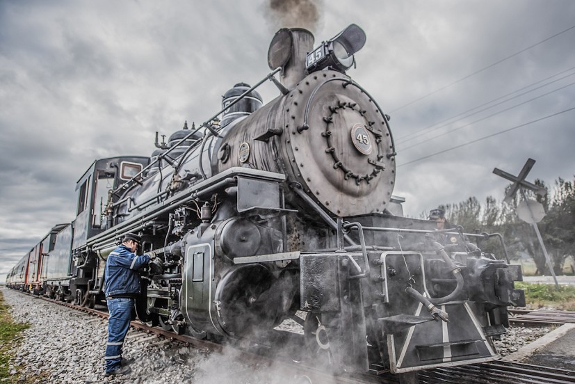 The train brings visitors to both the mountain and the now-famous man who lives and works on it.  © Joshua Paul Akers