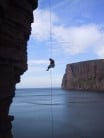 Gareth Hobson abseiling from the Old Man of Hoy