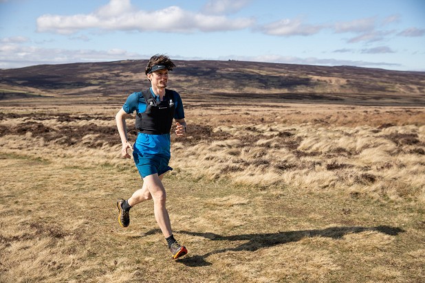 Running up towards Stanage wearing the Gecko Ultra V+   © UKC Gear