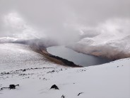 A brief glimpse of Loch Treig during winter ascent of Stob Coire Sgriodain in May