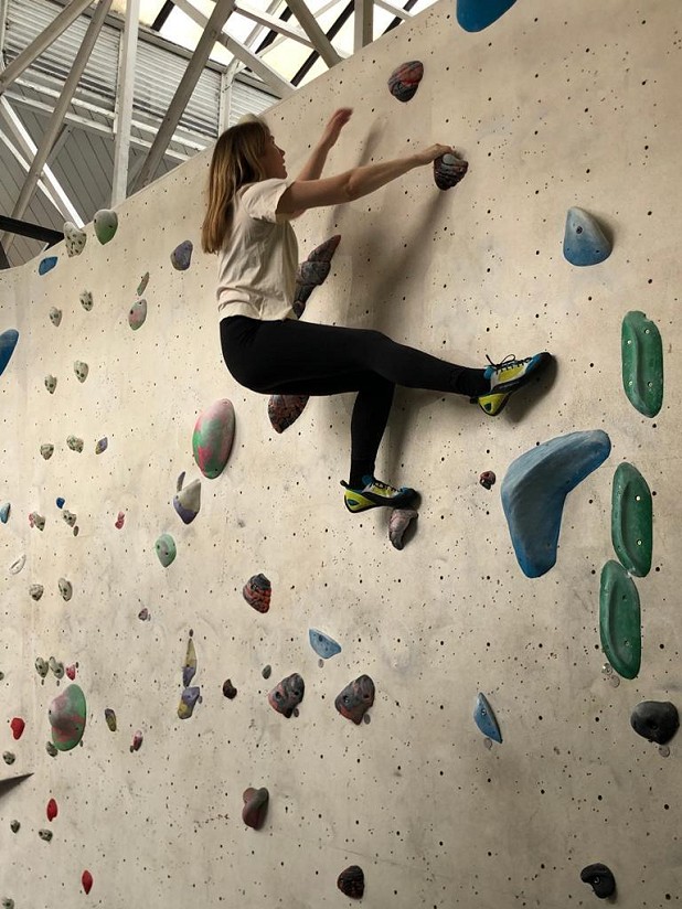 The author climbing at her local gym.  © Sian Polhill-Thomas