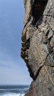 Simon Tiplady leading the excellent Moac Wall, Uig sea cliffs, Isle of Lewis.
