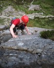 Alasdair Cavaye climbing Ordinary Route at Idwal Slabs in unusually dry conditions.