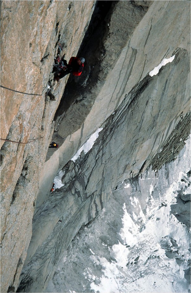 Looking down the face from high on the route, Louise in the grey helmet, Glenda in the yellow one, with the portaledges visible  © Kath Pyke