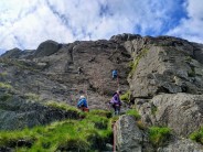 Climbers on Greased Lightning, Thunderclap and Thunder Slab on Little How Crag