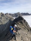Noah above the inversion whilst on the Cuillin Traverse.