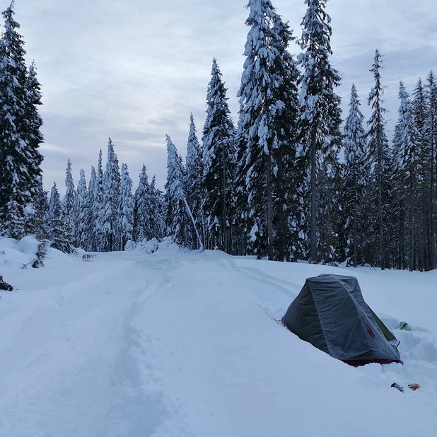 Camping on a road in the Romanian Carpathians - the only passing vehicles were snowmobiles  © Ursula Martin
