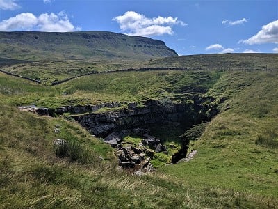 Pen-y-ghent from Hunt Pot  © Chris Scaife