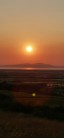 Late summer sunset over Solway Firth from top of Head End.