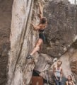 Tiba Vroom goes for the Ruby on the powerful crux on Rubis Sur L'Ongle