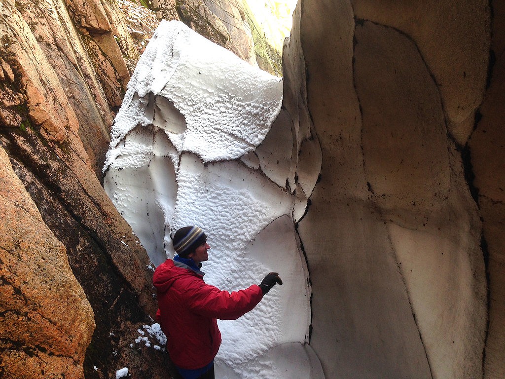 Assessing the Sphinx snow patch, with fresh autumn falls coating the old.  © Iain Cameron