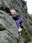 An unknown youngster enjoying some climbing on Windgather.