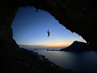 Grotta Diving. Descending from the classic DNA (7a) route in the Grande Grotta in Kalymnos.  © Polina Brodowski