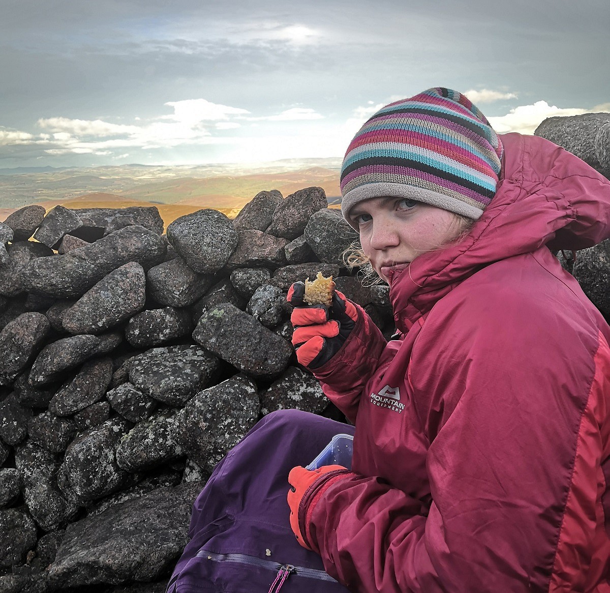 I’m really thrilled to be eating apple cake in -3 degrees on Mount Keen, and still look like a toddler at the age of 23  © Fliss Freeborn
