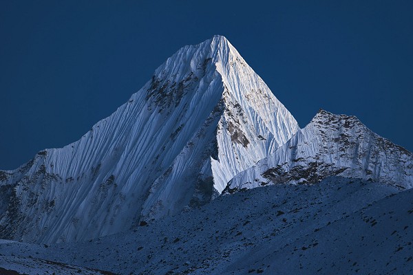The fluted snow spines of Malaphulan (6573m) in the moments after sunset  © Hamish Frost