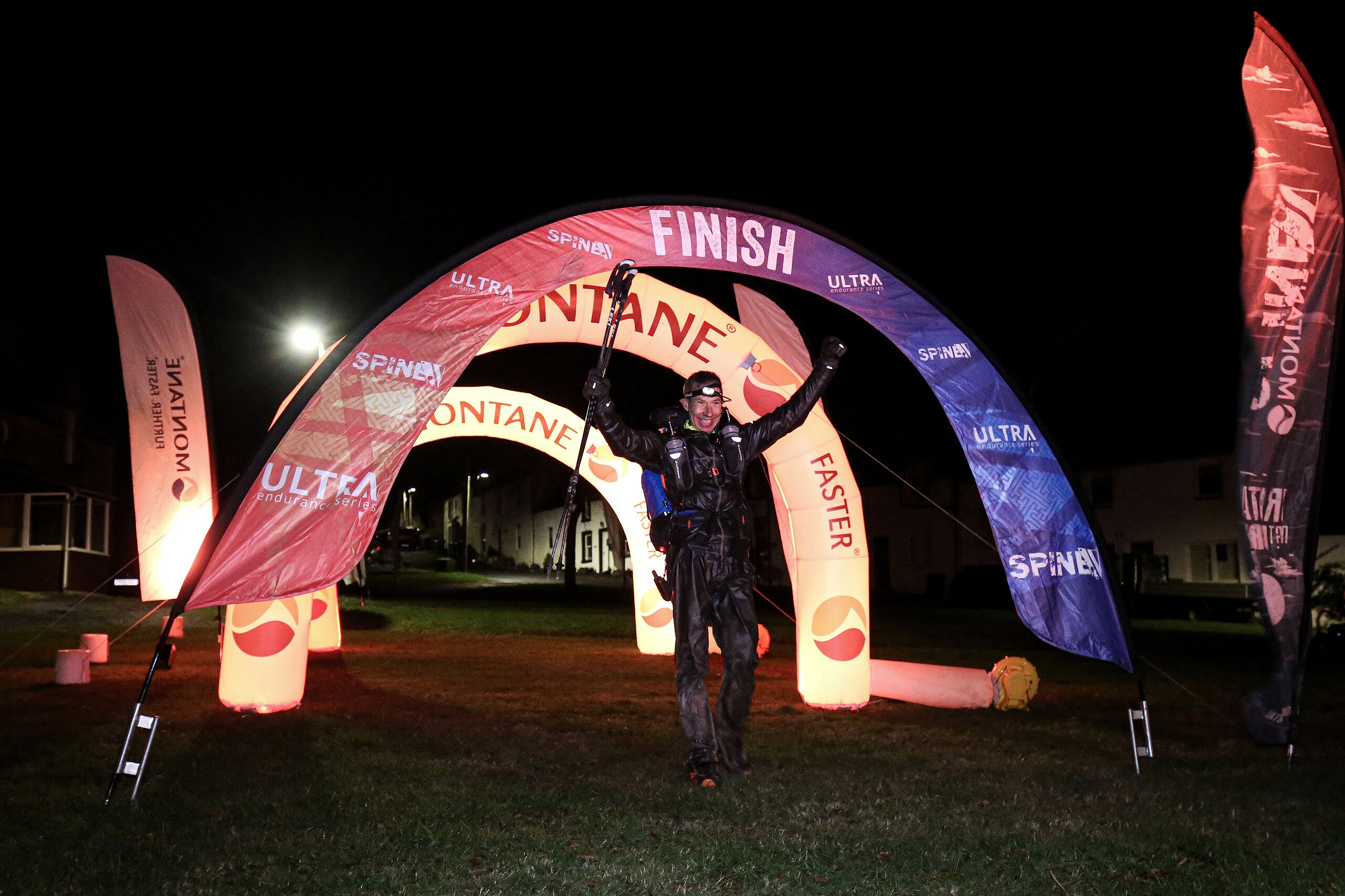 Eoin Keith crosses the line in Kirk Yetholm to take his second overall win  © Adam Jacobs/Montane Spine Race