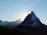 sun setting behind the Matterhorn