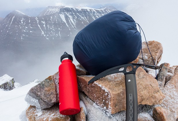 It's heavy and bulky - probably not a jacket to hang off your harness (620ml flask for scale)  © Dan Bailey