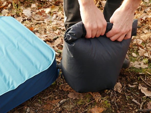Roll stuff sack down to inflate mattress  © UKC Gear