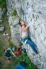 Ayesha on the crux of Shock of the New, 7b+ at Cheddar Gorge