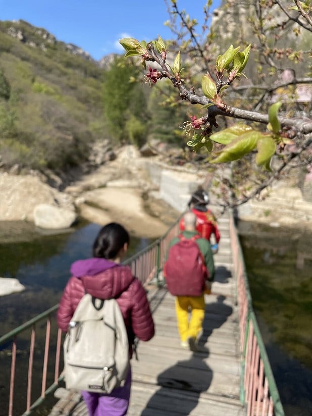Blossom means it's time to climb. Crossing the bridge into Jinglinggu  © Davros the Psyched