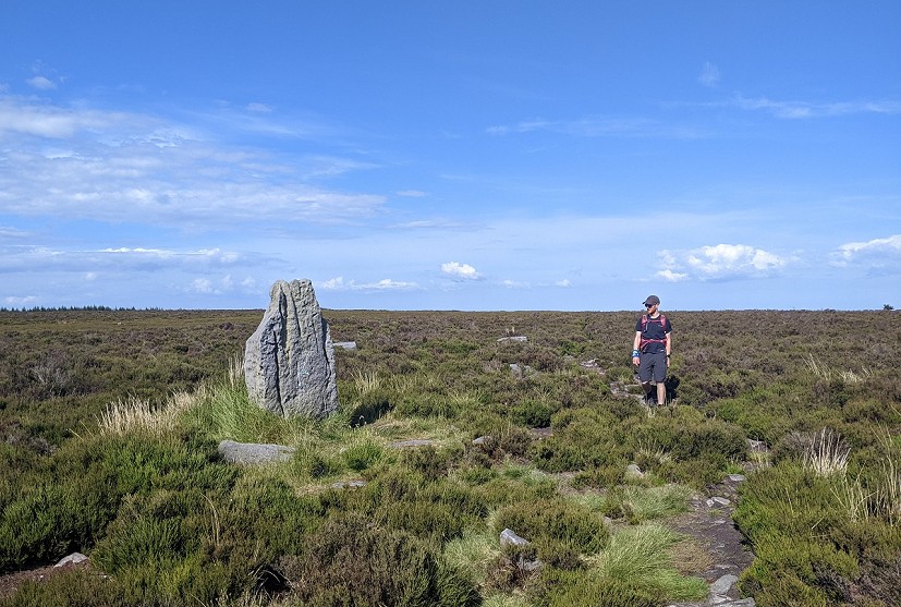 The ancient standing stone known as Blue Man-i'-th'-Moss  © Chris Scaife