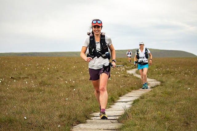 Lauren running along one of the many stone pitched sections of the Pennine Way