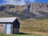 The Hutchison Memorial hut provided a great night's sleep before climbing The Talisman (behind) in perfect conditions.
