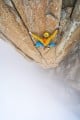 Atmospheric conditions on the Midi. Callum Johnson near the top of the first pitch of L'Enfer du Décor.<br>© Hamish Frost