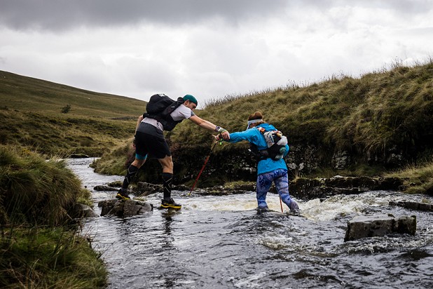 Runners supporting each other on day five of the 2022 Montane Dragon's Back Race   © Dragon's Back/No Limits Photography