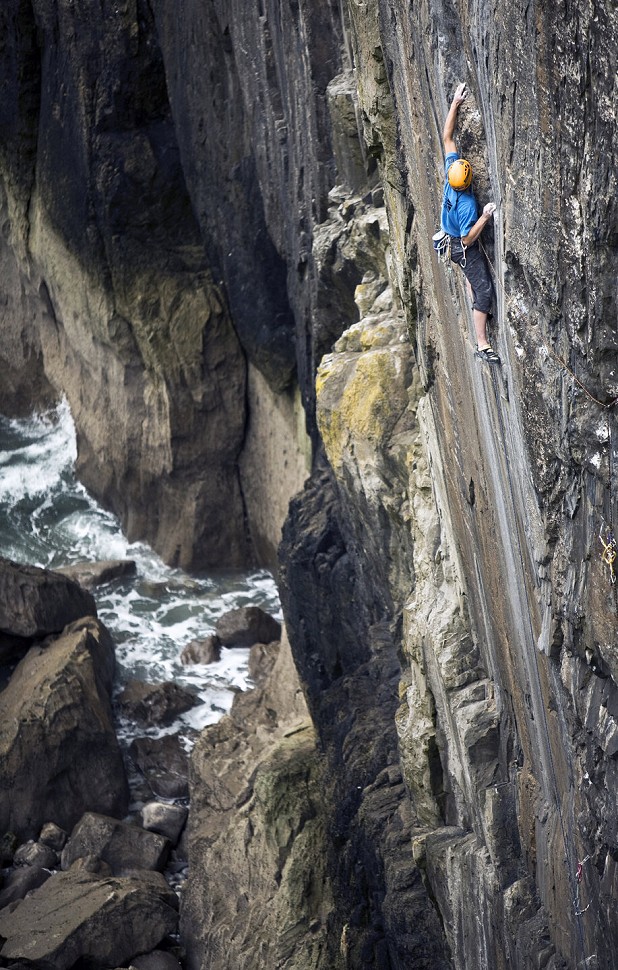 The author making the first ascent of Point Blank (E8 6c) in Stennis Ford, Pembroke, in 2009.  © Dave Pickford