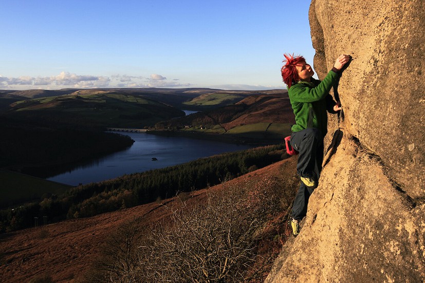 Malin Holmberg moving through autumnal gritstone perfection high on Bamford Edge on a November evening.  © Dave Pickford