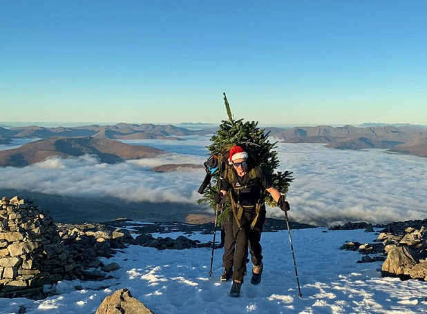 Ed Jackson, quadriplegic former rugby player, carries a Christmas tree to the summit of Ben Nevis  © Berghaus