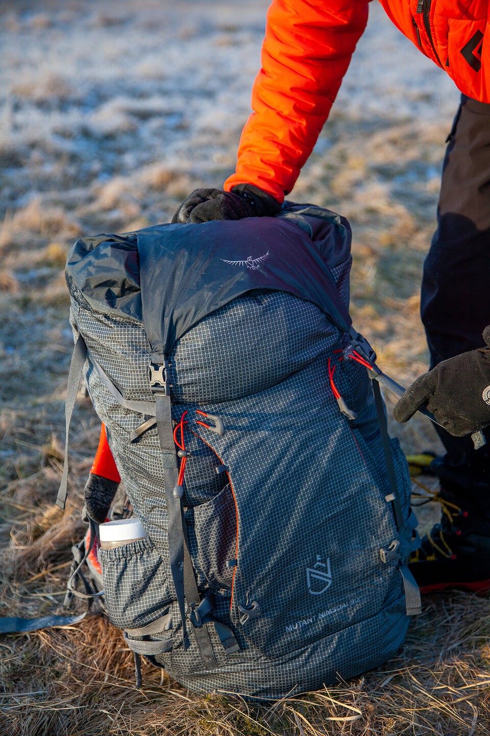 Lid off and flapjacket clipped in to front buckles for heading to a climb from our camp  © UKC Gear