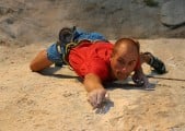 How small?! Adrian going for another tiny hold on Spartan Wall (F8b+), Kalymnos<br>© http://Climbers.net