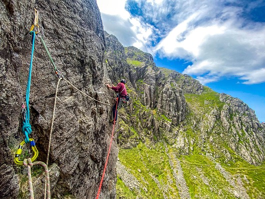 Mario traversing on Rib & Slab on a shady June day.  © Open Ascents