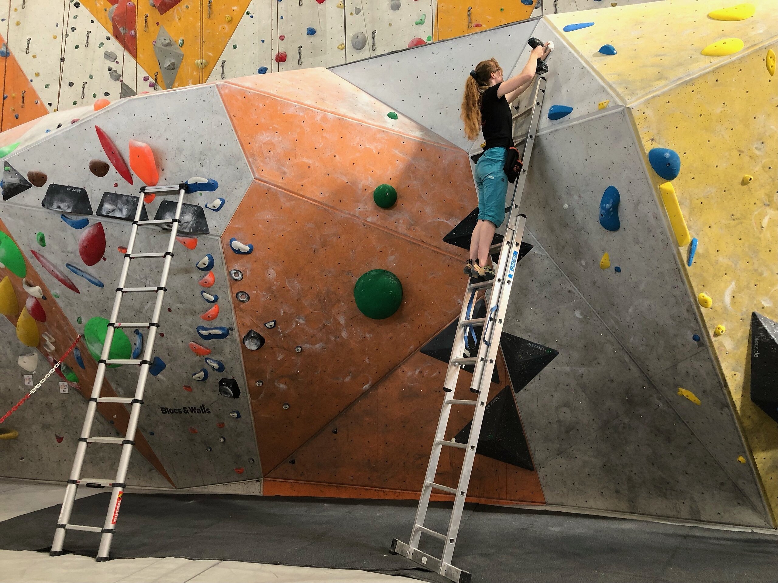 Amanda Vestergaard route setting. She is the only female route setter at her gym.  © Amanda Vestergaard