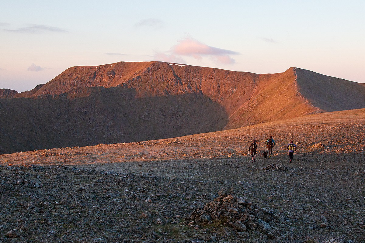 Nicky Spinks and team heading for Helvellyn on her legendary Double Bob Graham Round  © Dan Bailey