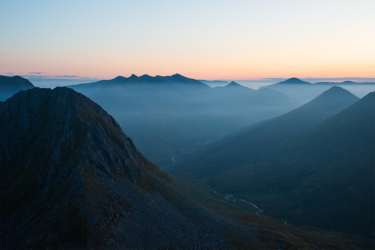 Grey Corries from the Mamores at dawn. You'll do all these summits, and many more, on a Ramsay Round  © Dan Bailey