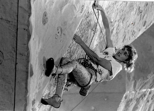 Susi Good clips a quickdraw high off the ground at the 1991 World Championships.  © Max John, courtesy of Susi Good