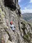 Dave England on p2 of White Ghyll wall. Taken from p2 the belay (below and to left of overhang).