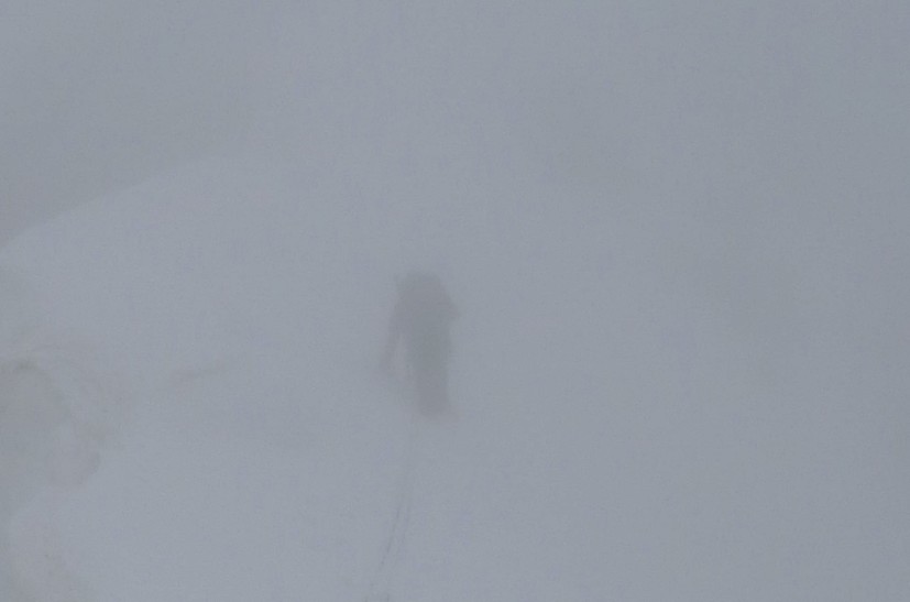 White-out on summit snow sloped, near the point where we turned back.  © Mick Fowler