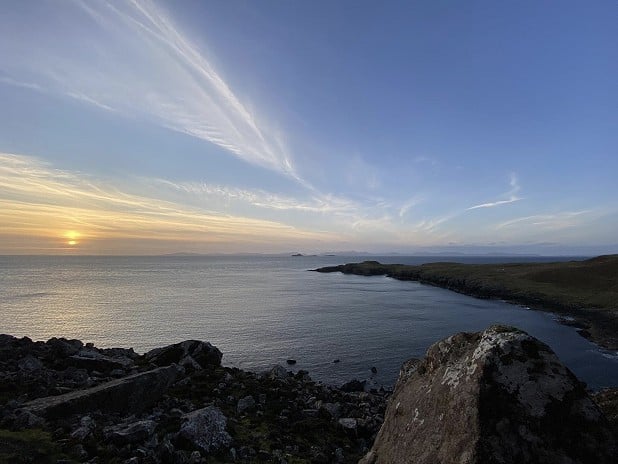 Sunset from Rubha Hunish, with the Outer Hebrides in the background  © Nathan Adam
