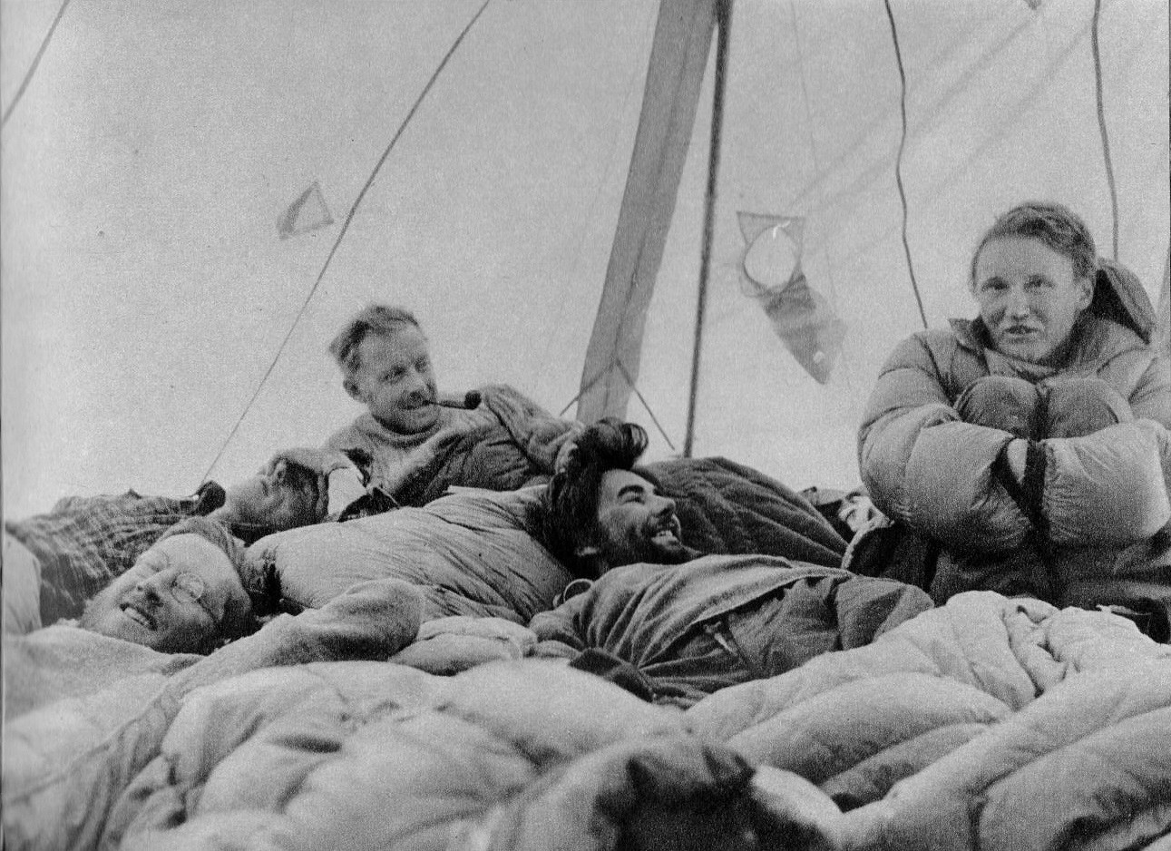 The 'Everest Position' horizontal in tent waiting for conditions to clear and the next load to come up  © uncredited photos presumably by Alfred Gregory