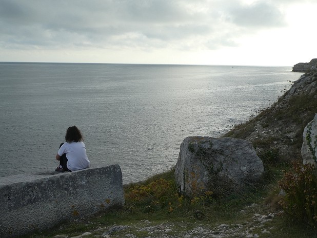 My daughter Naomi enjoying the end of the day overlooking the sea on Portland.  © Mark Cobb