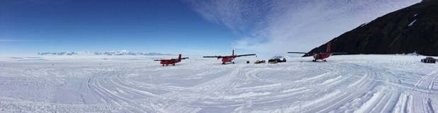 Twin Otters being refuelled and loaded at the Fossil Bluff skiway  © BAS