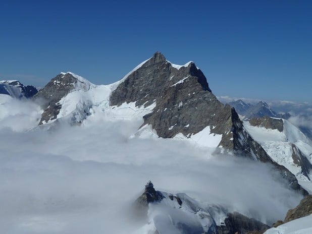 The Jungfrau, with the Jungfraujoch just poking through the cloud  © Iain Thow