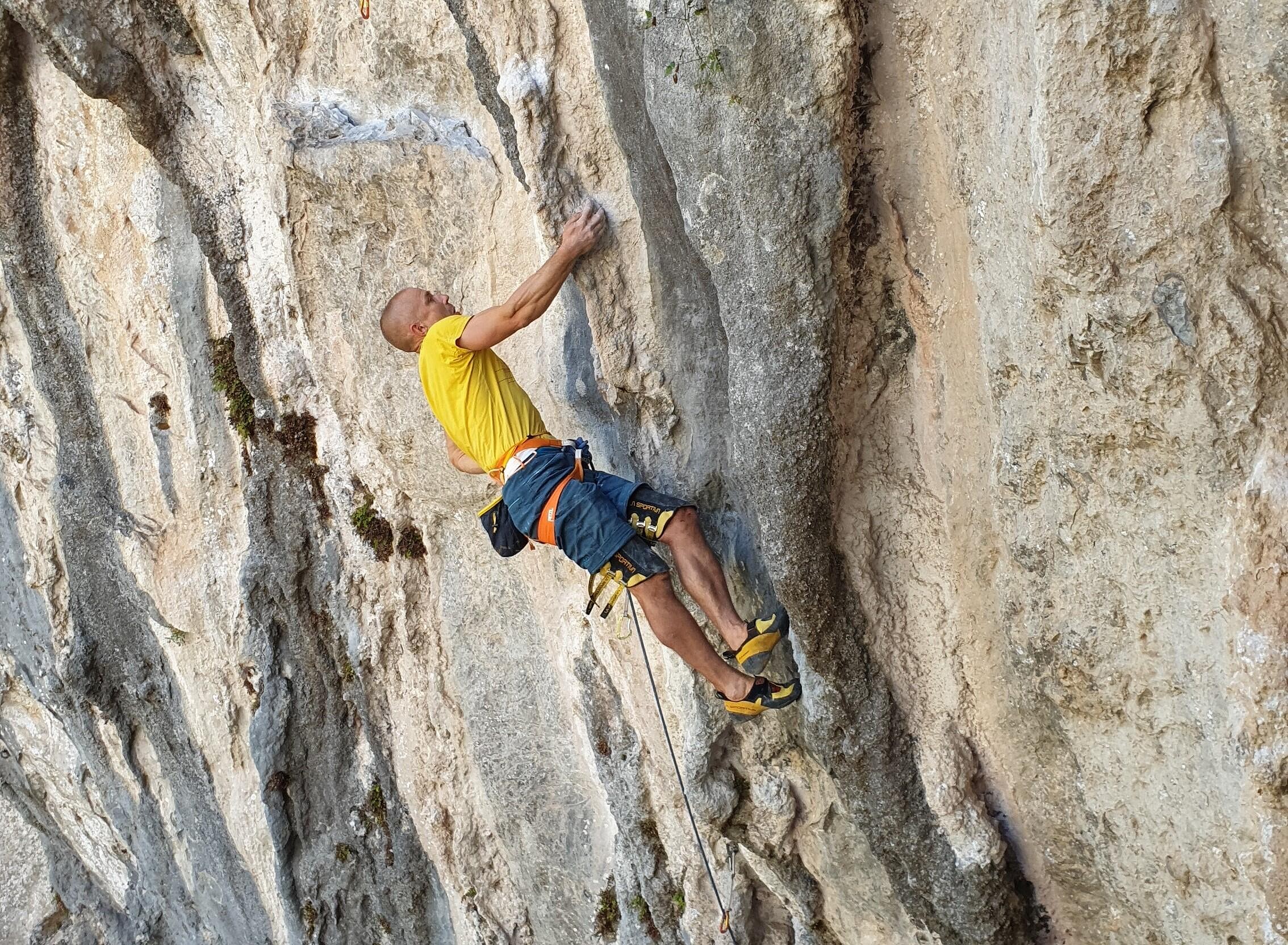Neil staying calm on a tough, tufa test-piece at Rumenes.  © Fraser