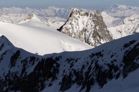Skiers traversing the Arête De Moming in Valais, Switzerland, 954 kb
