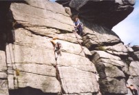 Jackie on Inaccessible Crack (VS 4c), Stanage High Neb
